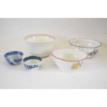 Group of English porcelains including a New Hall trench mortar tea bowl, Caughley pattern