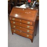 Georgian mahogany bureau with fall front opening to a pigeonholed interior over a four drawer