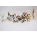 Group of Continental porcelain figures including a shepherd and shepherdess on oval mount (13)