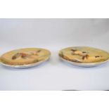 Pair of Bossons plaster wall plaques, both decorated with pheasants and ducks in relief, 36cm