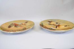 Pair of Bossons plaster wall plaques, both decorated with pheasants and ducks in relief, 36cm