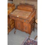 Late Victorian Davenport desk, the top with hinged stationery compartment over a writing slope