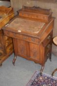 Late Victorian Davenport desk, the top with hinged stationery compartment over a writing slope