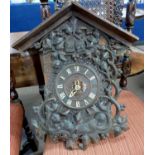 Late 19th century/early 20th century Continental cuckoo clock with arched case decorated with
