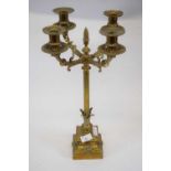 Four branch brass candelabra, central Corinthian column with acorn type knop, supported by square