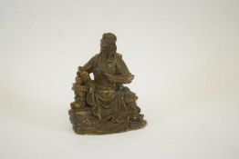 Metal figure of a Chinese deity reading a scroll, 13cm high