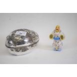 Silver coloured metal egg with an Oriental scene of family fishing, together with a Continental