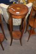 Edwardian mahogany two-tier plant stand of circular form with inlaid decoration, on outswept legs,