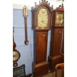 Georgian oak cased longcase clock, the arched hood with whale tail pediment, pillared side