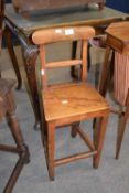 Small 19th century child's correction chair with bar back, 76cm high