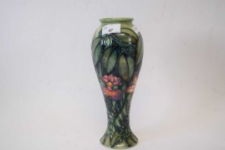 A Moorcroft vase with tube lined decoration in the Rain Forest pattern29cmGood condition