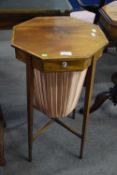 Late 19th century mahogany and inlaid octagonal sewing table with hinged lid opening to a fitted