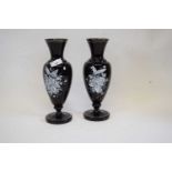 Pair of Victorian black coloured glass vases, finely painted with a floral spray and butterflies,