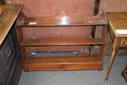 Early 20th century mahogany open wall shelf with two base drawers, 91cm wide