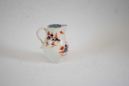A Lowestoft porcelain sparrowbeak jug c.1780 decorated in polychrome with the Dolls House