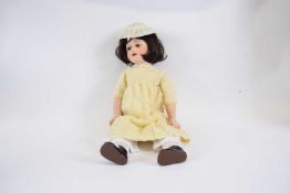 Doll in original clothes, marked 'Marggrets, Germany, S & H'