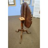 19th century and later mahogany snap-top supper table, the top with shaped edge over a turned column