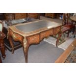 Reproduction Continental bureau plat fitted with three drawers and an inset writing surface,