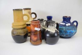 Group of West German pottery vases and ewers, all with typical mottled and lava like designs (7),