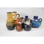 Group of West German pottery vases and ewers, all with typical mottled and lava like designs (7),