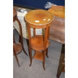 Edwardian mahogany and inlaid circular three tier plant stand raised on outswept legs, 94cm high
