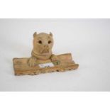 Unusual softwood carved inkwell, the inkwell carved as a dog's head with glass eyes