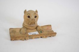 Unusual softwood carved inkwell, the inkwell carved as a dog's head with glass eyes