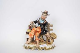 Large Italian pottery model of a man on bench on shaped base
