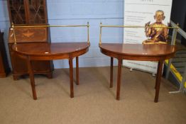 Pair of 19th century mahogany D-shaped console tables with brass railed backs, 121cm wide (2)