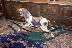 19th century and later small rocking horse with dappled grey painted body, raised on green painted