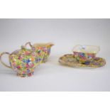 Quantity of Grimwades tea wares in the Sweet Pea design comprising a tea pot, milk jug, sugar bowl