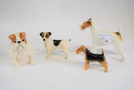 A Beswick model of a terrier Travera Romulus, a further terrier, model of a bulldog and model of a