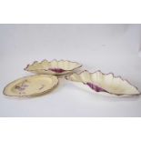 Pair of shell shaped creamware dishes, probably Wedgwood, together with a small shaped plate with