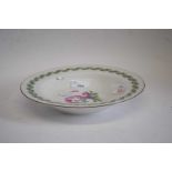 19th century Berlin porcelain plate with floral design to the centre within ribbon border, 23cm