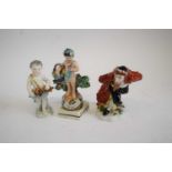 Capo di Monte Comedia del'Arte figure of Pantalone, together with a small cherub musician with