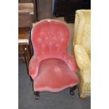 Victorian pink velour upholstered button back small arm or nursing chair raised on short scrolled