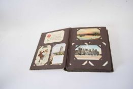 Postcard album with mainly topographical views, some photographic