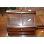 19th century colonial hardwood writing box of wedge form, the fall front opening to reveal an