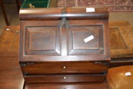 19th century colonial hardwood writing box of wedge form, the fall front opening to reveal an