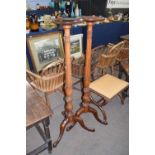 Near pair of early 20th century mahogany torchere plant stands, tapering columns with ribbed