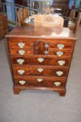 A Georgian style mahogany Norfolk chest with four small drawers, central arched door and three