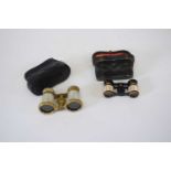 Two opera glasses in leather pouches, one by Negretti & Zambra (2)