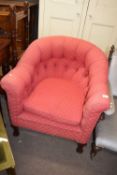 20th century red buttoned upholstered tub chair on short wooden legs, 80cm high