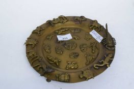 Brass tray with various designs of monkeys, horses, scorpion etc