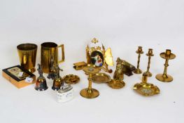 Quantity of brass wares, mugs, pair of candlesticks, brass bells etc including an enamel plaque of