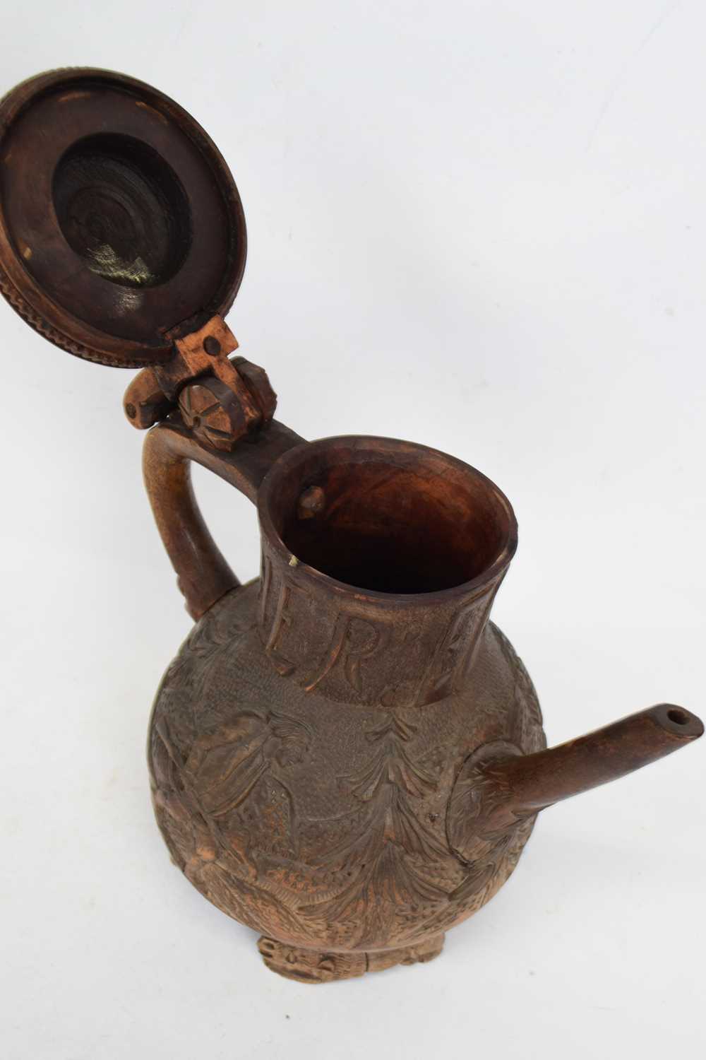 An unusual European, probably Black Forest, wooden coffee pot, probably for marriage, the neck - Image 3 of 3