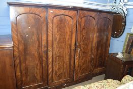 A large Victorian mahogany wardrobe with four doors. 246cm wide
