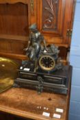 19th century mantel clock with bronzed spelter figural mount of a lady and attendant dog, raised