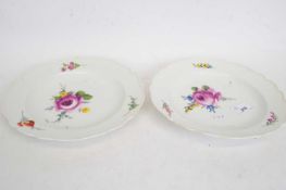 Pair of Marcolini Meissen plates within shaped rims, finely painted with floral sprays (2), 23cm