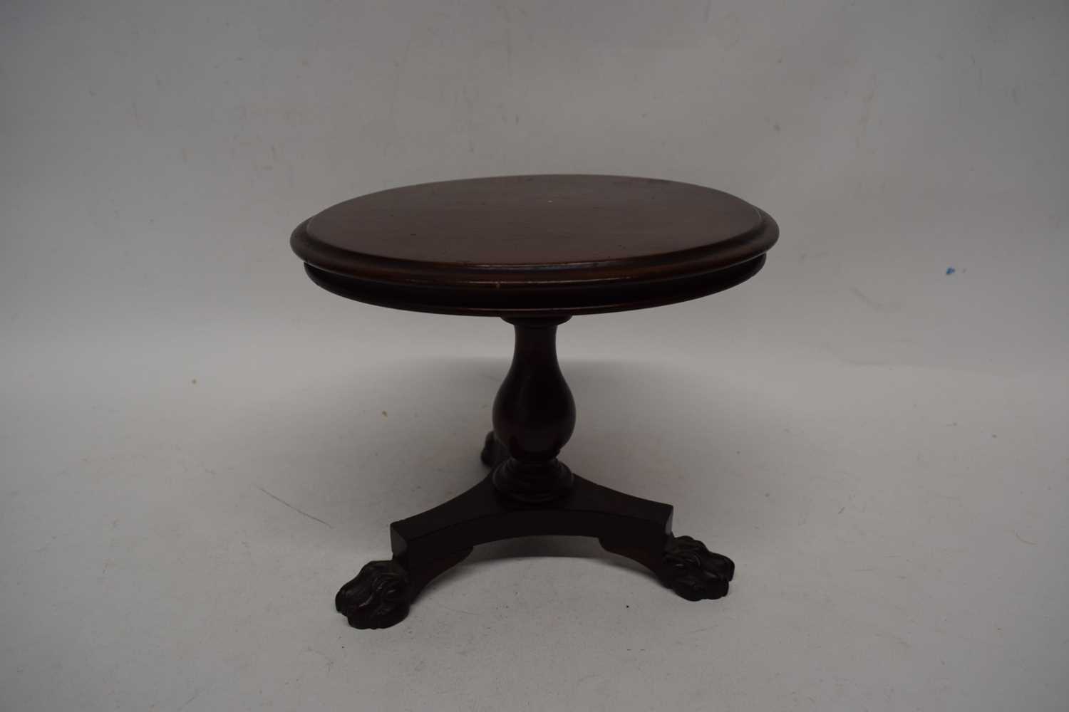 19th century apprentice mahogany dining table, the circular top raised on a turned column and
